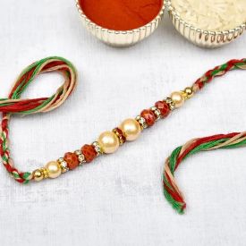 Red and White Pearls Rakhi