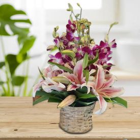 Elegant Floral Arrangement of orchids & lilies