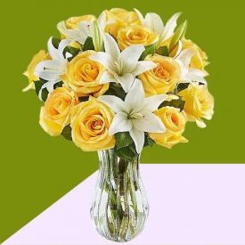 Yellow lily and white Rose in vase