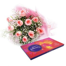 Pink roses with cadbury celebration