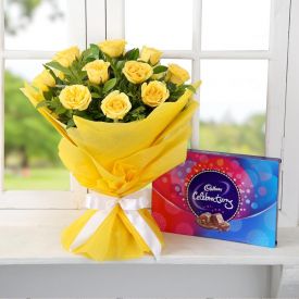 Yellow roses and cadbury celebration