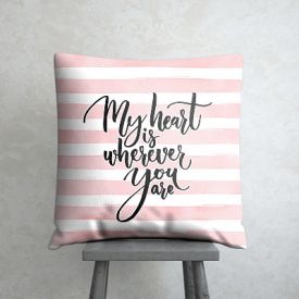 pink and white cushion