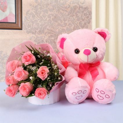 Pink roses with teddy bear