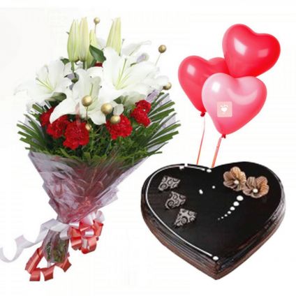 1 kg heart shaped chocolate truffle cake with 7 red carnations, 3 white lilies with balloon