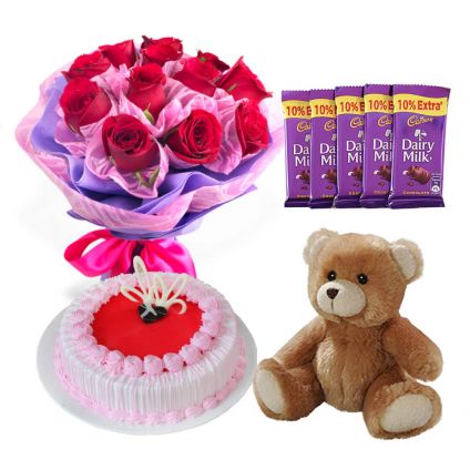 Red Roses, Strawberry cake, teddy bear with dairy milk