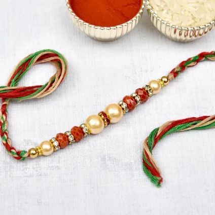 Red and White Pearls Rakhi