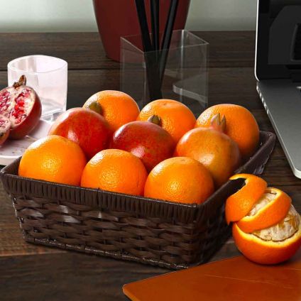 Oranges And Pomegranate in Basket