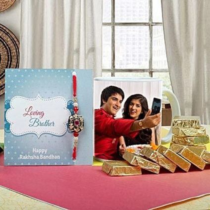 Personalised photo mug, a beautiful rakhi, roli chawal and greeting card