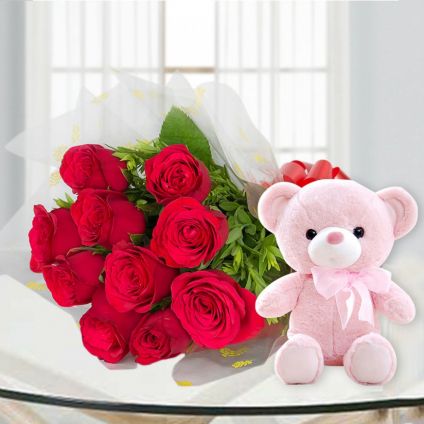 Red roses with teddy bear