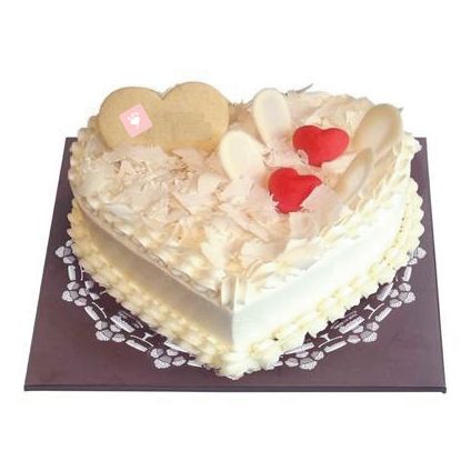Heart shaped white forest Cake
