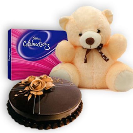 1kg chococlate cake , 12 inch teddy and cadbury celebrations