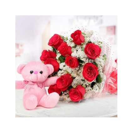 Teddy bear with rose