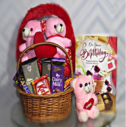 Lovely combo of Greeting teddy & chocolates