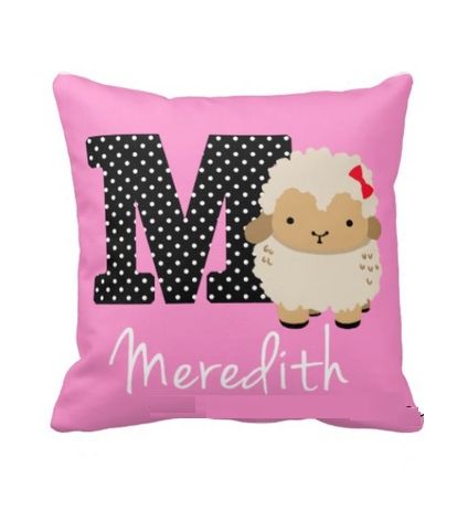 Alphbat M pink cushion